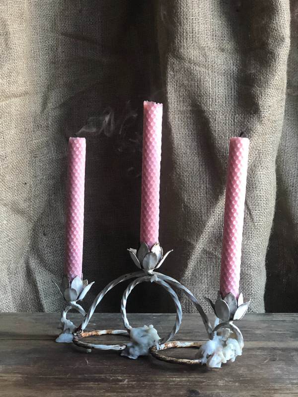 Twisted metal candelabra with candle