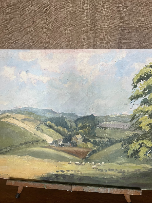 Close view of Goddard painting of a country valley scene