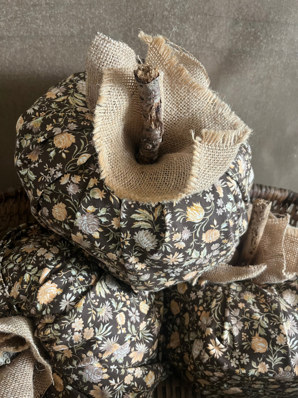 Close up of brown floral pumpkin showing hessian & twig details
