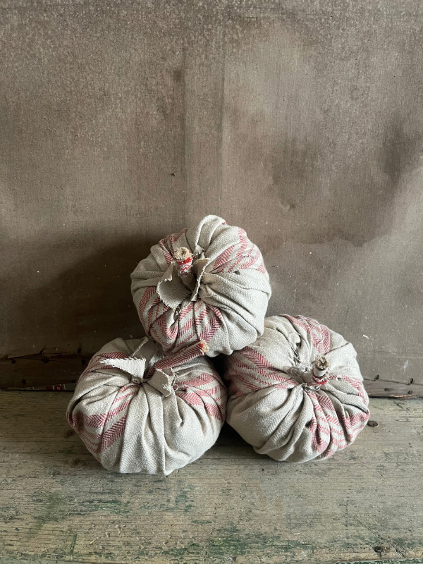 Group-of-handmade-pumpkins-in-beige-ticking-fabri